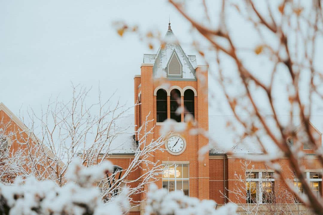 clock tower during winter snow