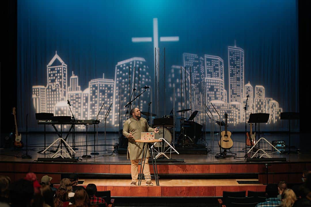 african american man speaking in a chapel service at NNU