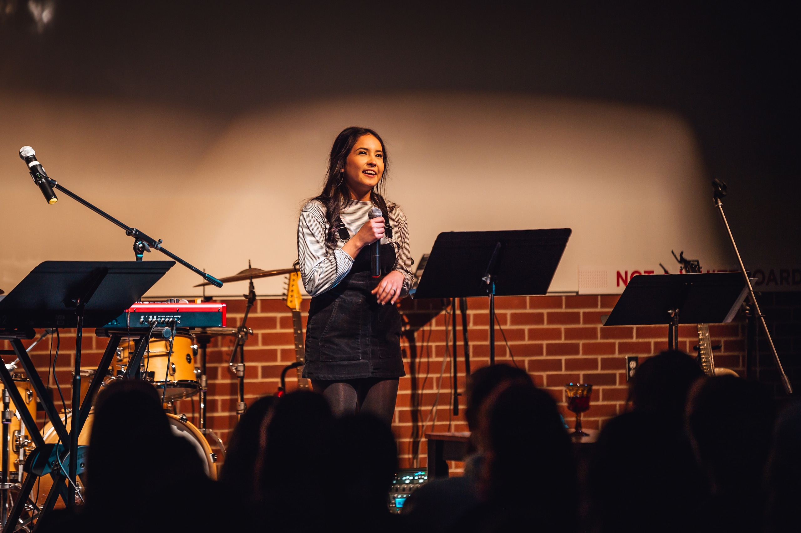 A female student speaks at a Timeout event