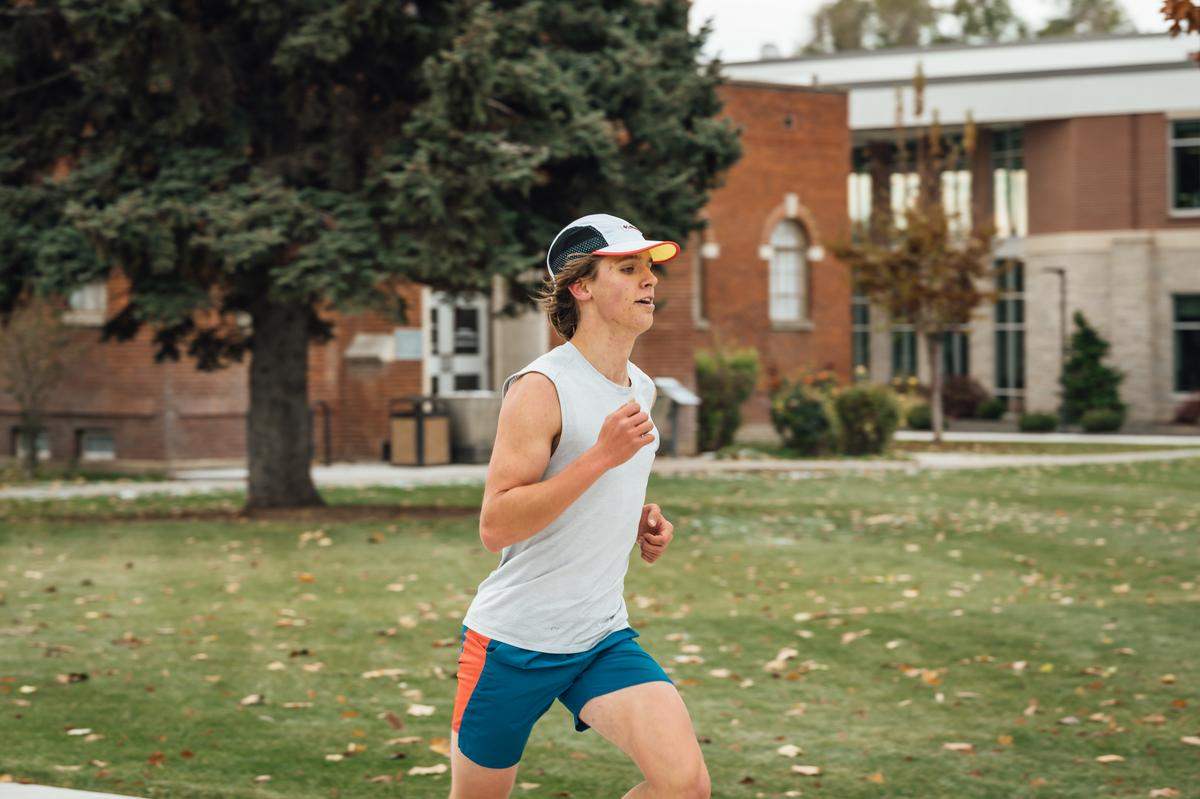 student running on campus