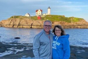 Mark and Kim DeMichael at a lighthouse