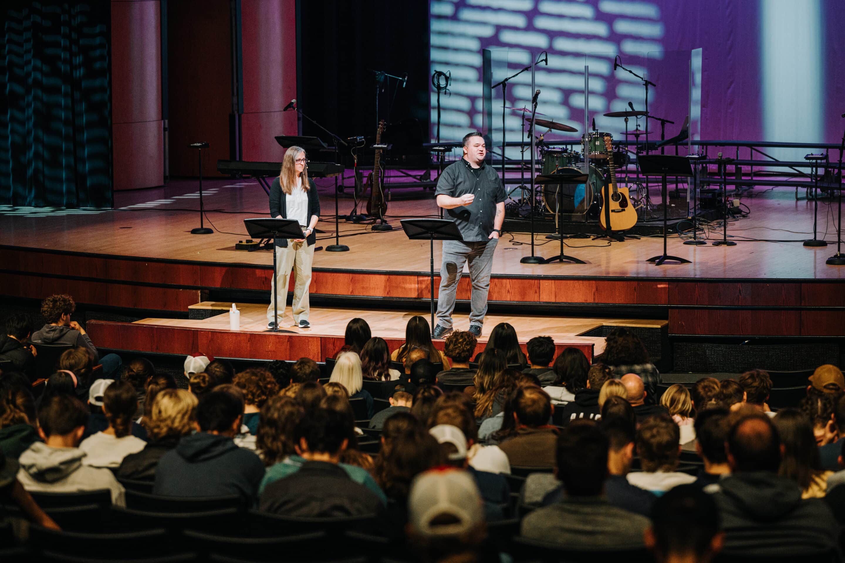 The Call 2025 woman preaching in front of crowd