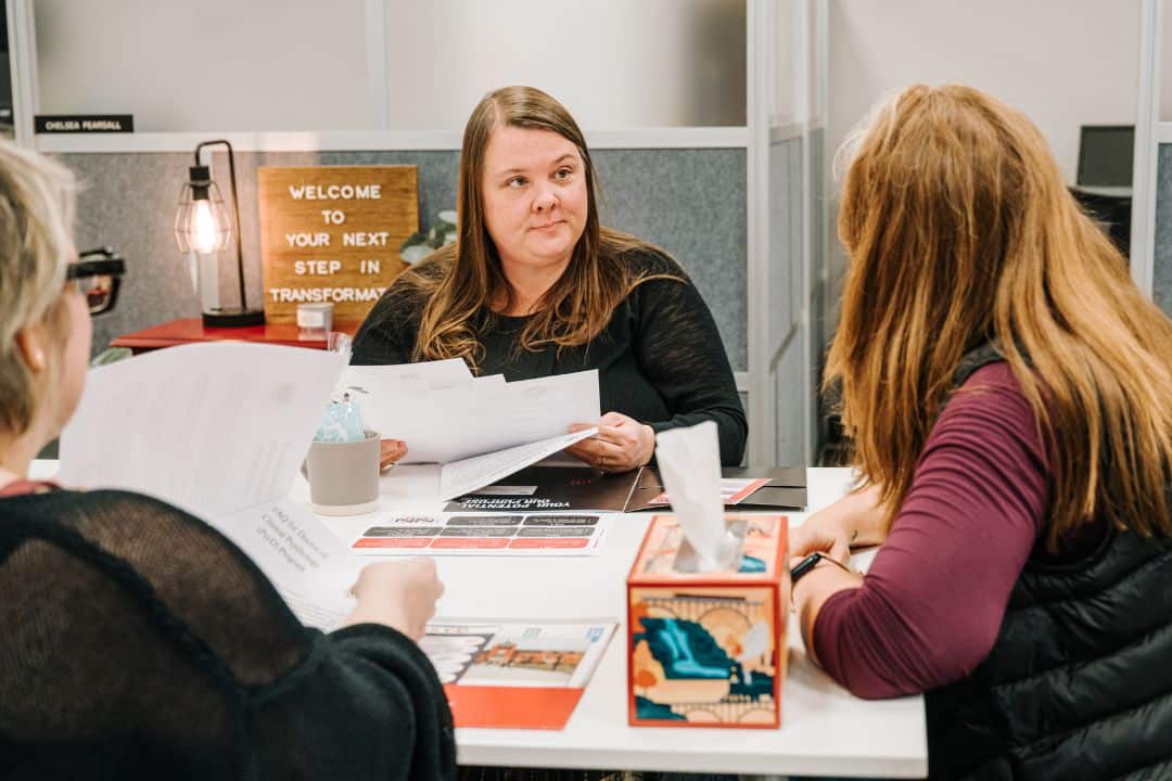 Adult Female working with Admissions Counselor