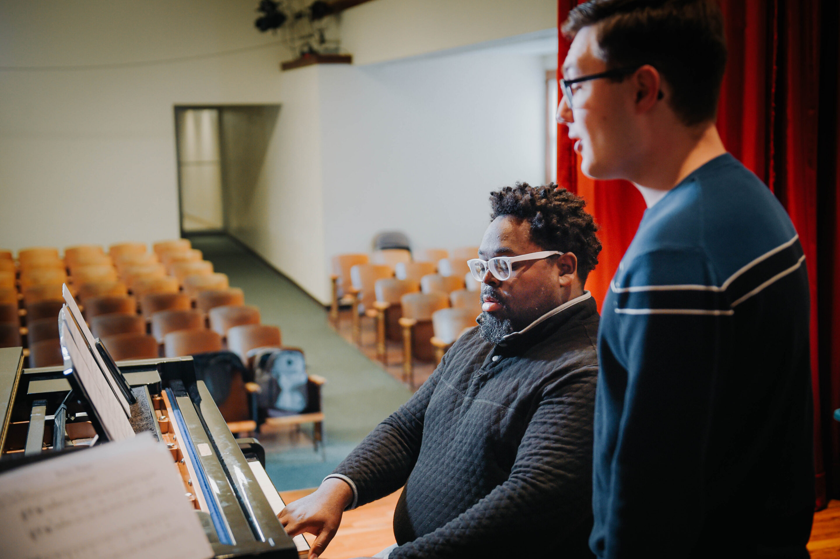 Music professor in private lessons with vocal performance student.